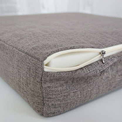 Fermeture éclair de la housse amovible d'un coussin d'assise en mousse