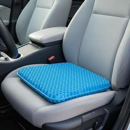 Coussin en gel nid d'abeille posé sur le siège conducteur d'une voiture