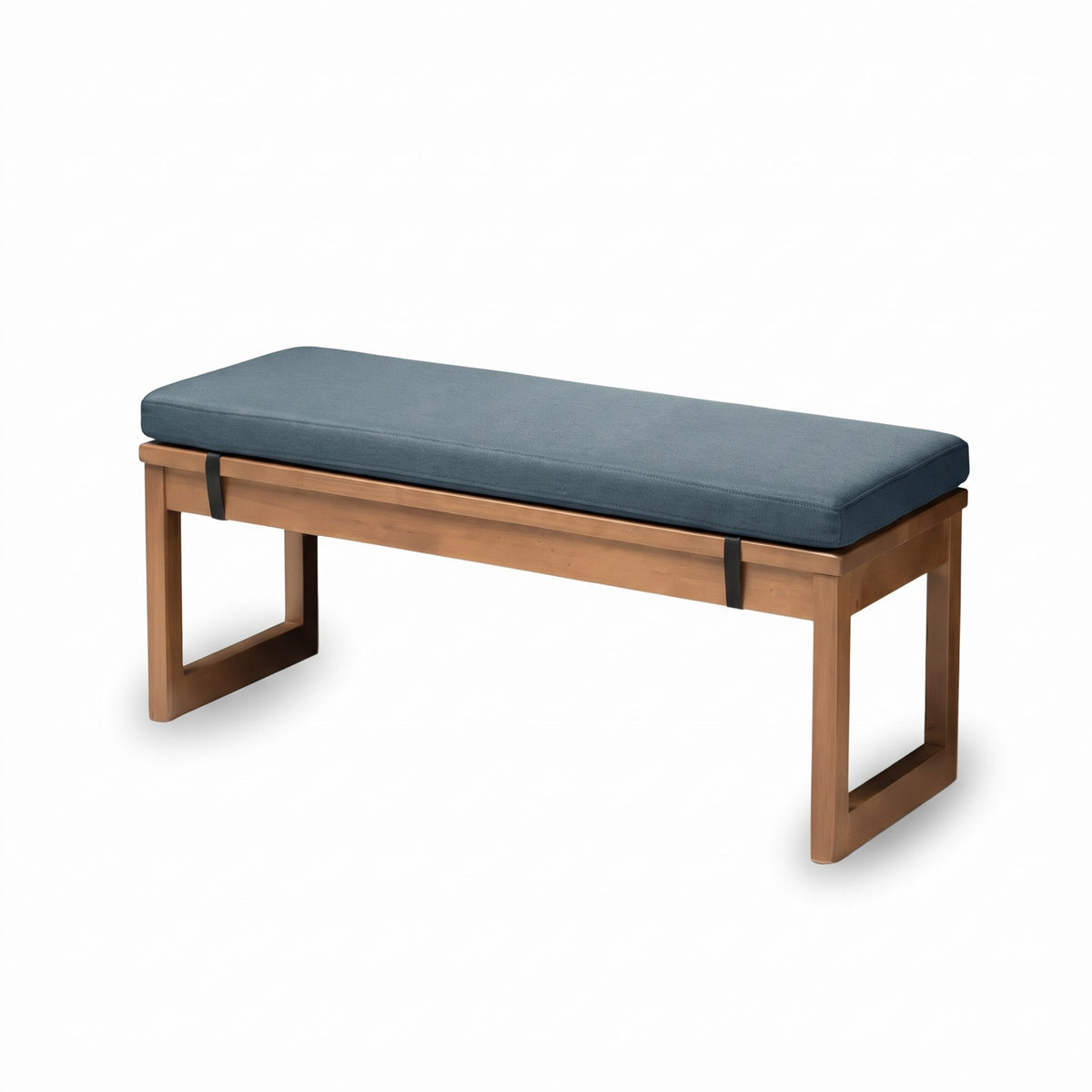 Coussin pour banc bleu marine de 3 cm d'épaisseur sur un banc en bois