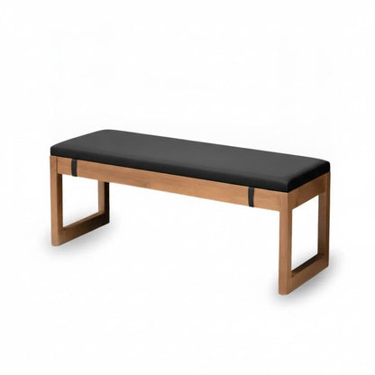 Coussin pour banc noir de 3 cm d'épaisseur sur un banc en bois
