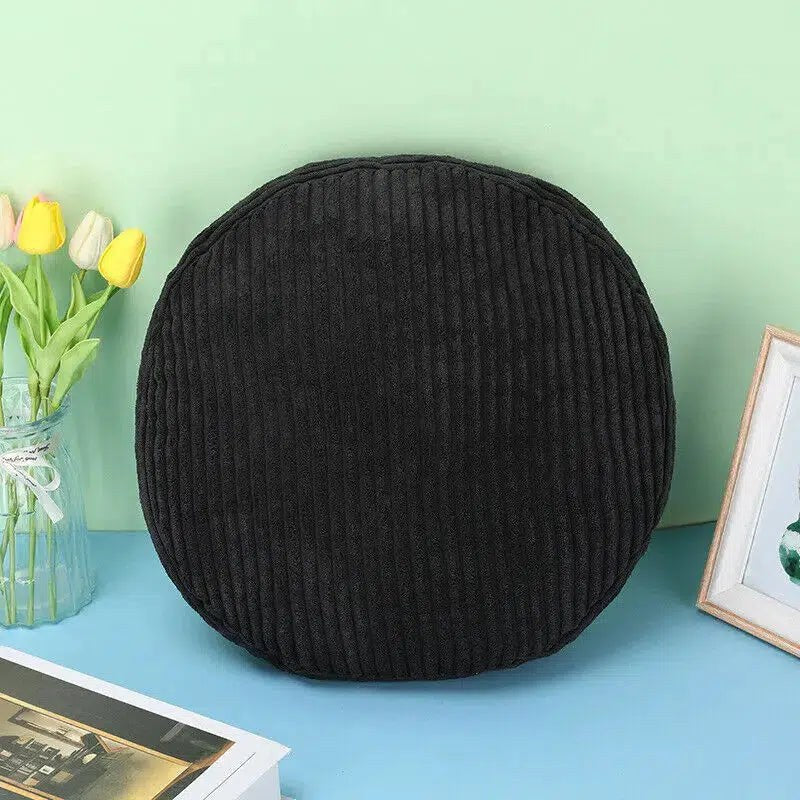 Coussin rond en velours côtelé noir