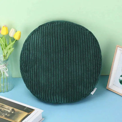Coussin rond en velours côtelé vert
