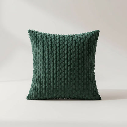 Housse de coussin vert bouteille en maille texturée en relief, vue de face