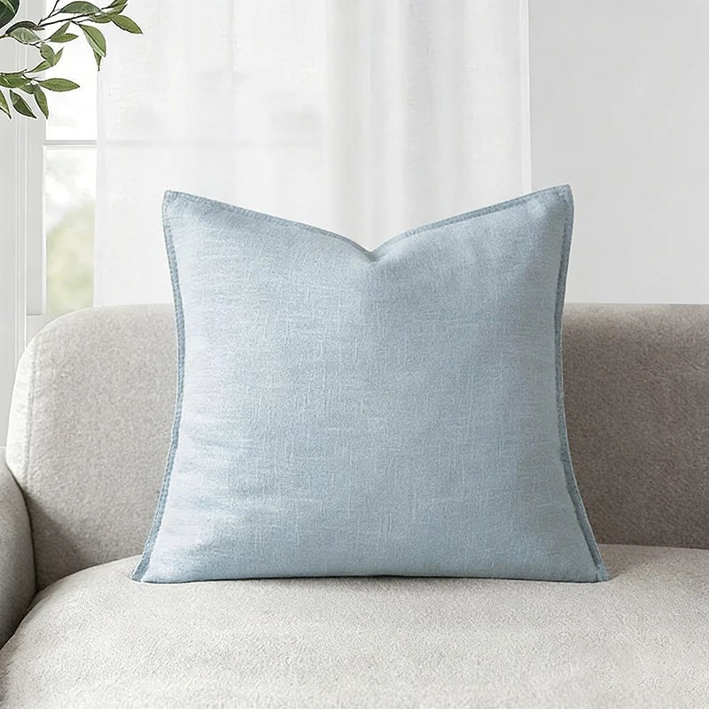Housse de coussin bleue unie aspect toile lavée, coloris bleu gris