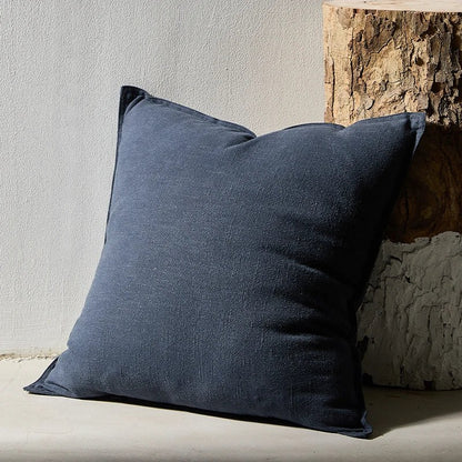 Housse de coussin bleue unie aspect toile lavée, coloris bleu marine