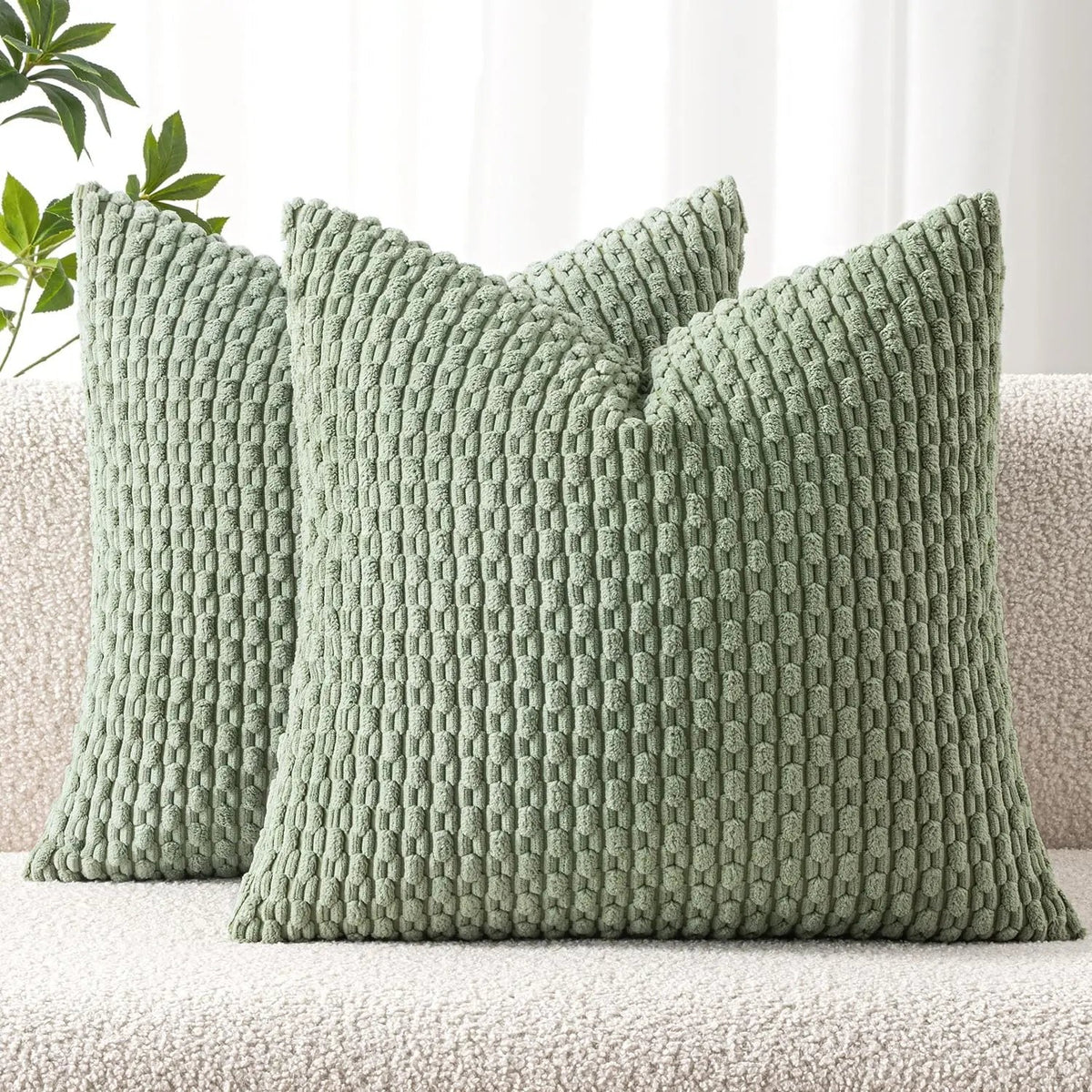 Housse de coussin vert sauge en maille texturée en relief