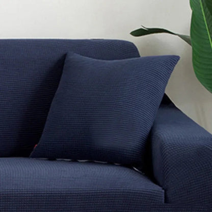 Coloris bleu marine de la housse de coussin en maille texturée