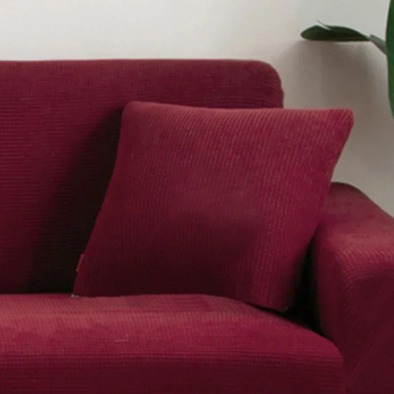 Coloris bordeaux de la housse de coussin en maille texturée