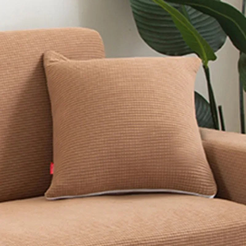 Coloris caramel de la housse de coussin en maille texturée