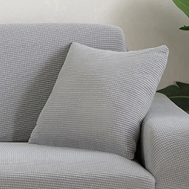 Coloris gris clair de la housse de coussin en maille texturée