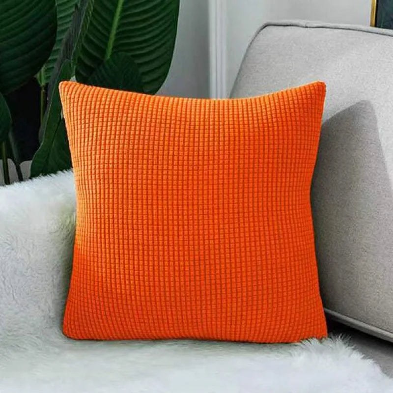 Coloris orange de la housse de coussin en maille texturée