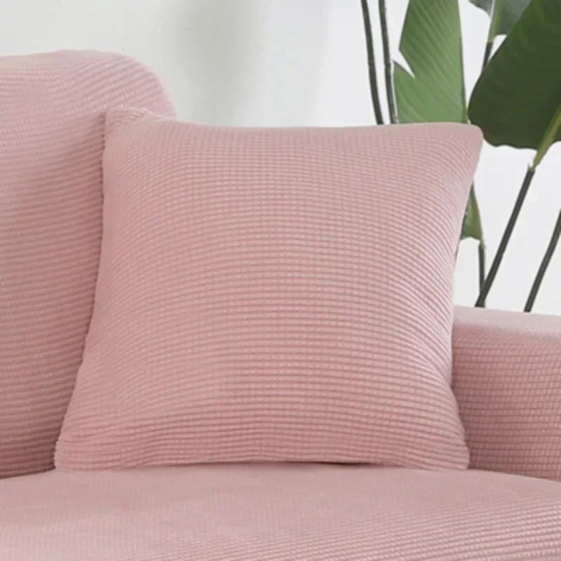 Coloris rose poudré de la housse de coussin en maille texturée