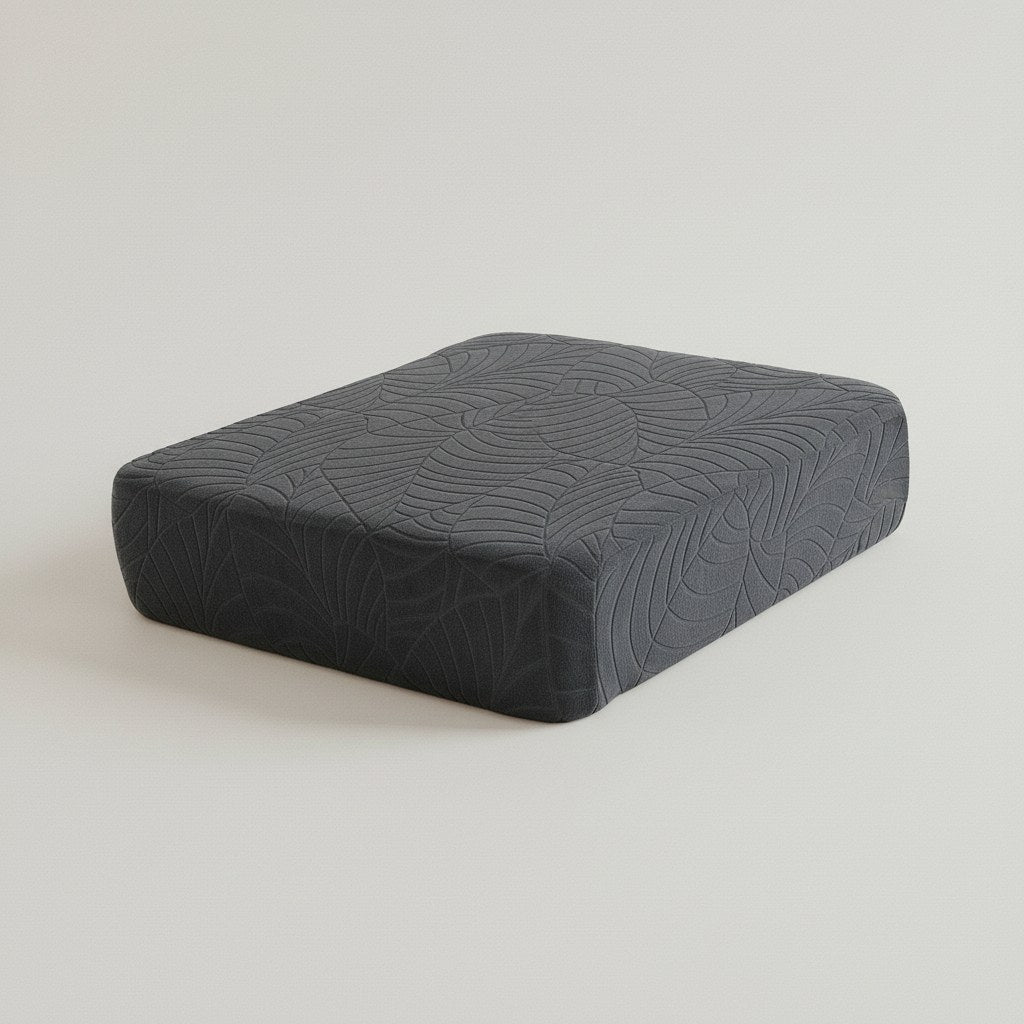 Coussin d'assise habillé d'une housse extensible en jacquard gris anthracite à motif de feuilles