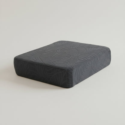 Coussin d'assise habillé d'une housse extensible en jacquard gris anthracite à motif de feuilles