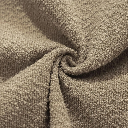 Détail du tissu bouclette d'une housse de coussin